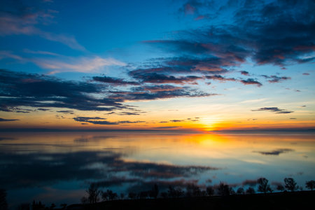 Sunset at the lake Balaton in Balatonakarattyaの写真素材