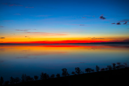 Sunset at the lake Balaton in Balatonakarattyaの写真素材