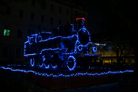Steam locomotive train in the night city of Szeged