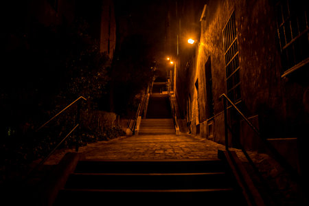Street photo in Budapest at night with stairs