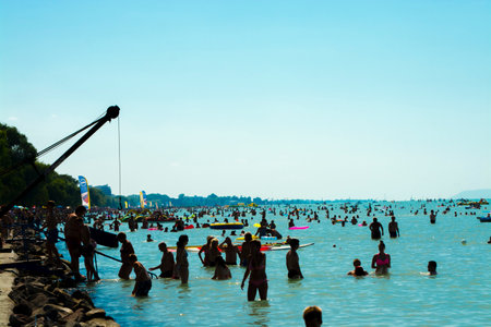 SIOFOK, HUNGARY - JULY 30, 2016: Huge crowd in the Golden Beach of Siofok Lake Balaton, Hungaryのeditorial素材