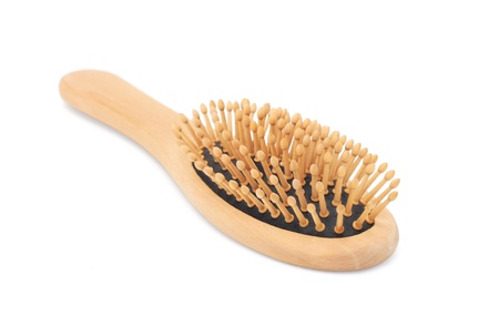 wooden comb on whiteの写真素材