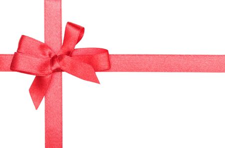 red satin ribbon and bow isolated on whiteの写真素材