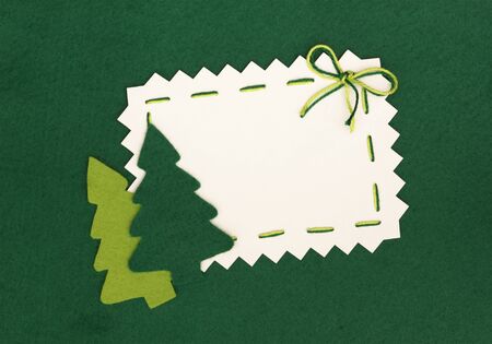 Christmas empty postcard  and new year trees on green background の写真素材