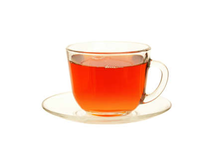 tea in glass cup  on saucer isolated on  whiteの写真素材
