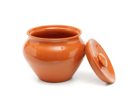 open clay pot for cooking isolated on whiteの写真素材