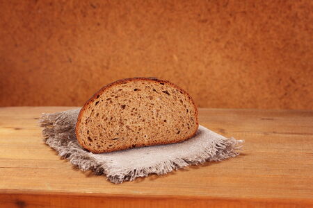 slice of rye bread on napkinの写真素材