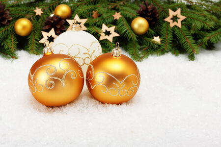 Christmas card: three balls and Christmas tree border with decorations on whiteの写真素材