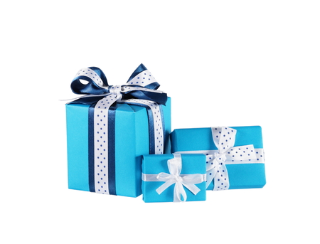 wrapped blue gift boxes with ribbon bows isolated on whiteの写真素材