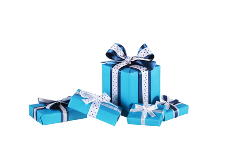 wrapped blue gift boxes with ribbon bows isolated on whiteの写真素材