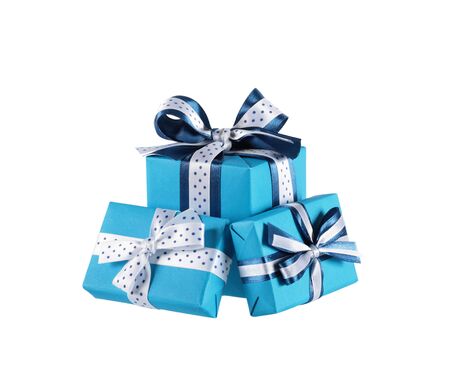 wrapped blue gift boxes with ribbon bows isolated on whiteの写真素材
