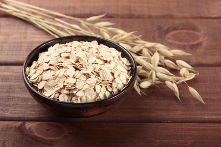 Oat stems and oat flakesの写真素材