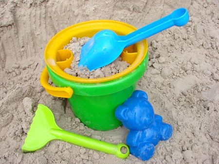 Toys for sand a bucket a shovel a raker                                の写真素材