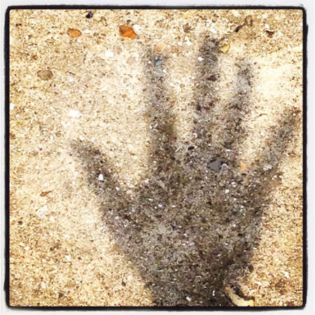 Hand shadow on old normandy bunkerの素材