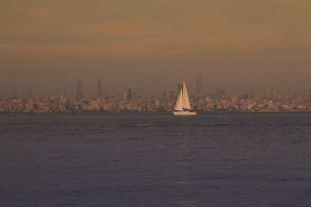 Single yacht in the sea near in the duskの写真素材