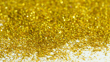 Blur golden background from gold tinsels with bokehの写真素材