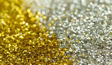golden and silver background from tinsels with bokehの写真素材