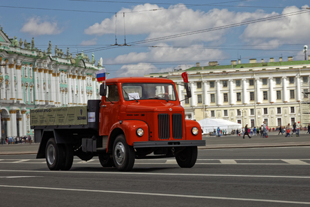 SAINT-PETERSBURG, RUSSIA - 21 MAY 2017: Parade of vintage cars. Old automobiles. Tinted photo.のeditorial素材
