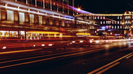 Blurred night traffic. Light trails on the road at night on Kamennoostrovskiy prospect in Saint-Petersburg, Russiaの写真素材