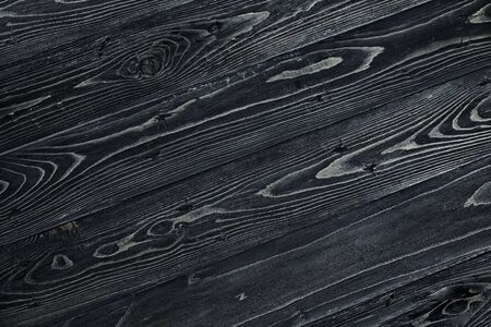 Texture of dark wood table. Black vintage backgroundの写真素材