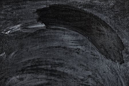 Texture of dark chalkboard. Black vintage backgroundの写真素材