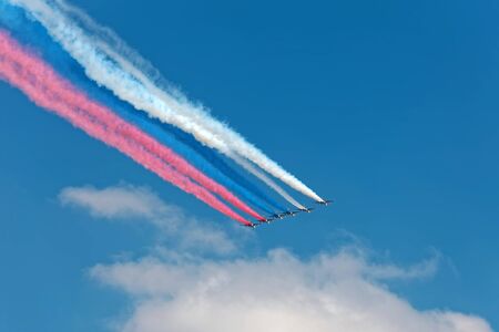 SAINT-PETERSBURG, RUSSIA - JULY 29, 2018: Warships parade on the Neva river. Day of the Russian Navy. Combat aircraft in skyのeditorial素材