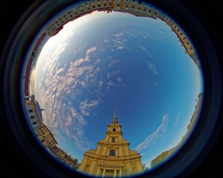 SAINT-PETERSBURG, RUSSIA - 15 AUGUST 2018: Peter and Paul cathedral iin Peter and Paul Fortress. Fish eye lens creating a circular super wide angle view.のeditorial素材