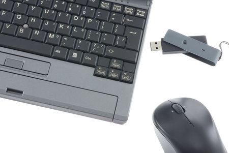 Laptop, mouse and USB flash isolated on white