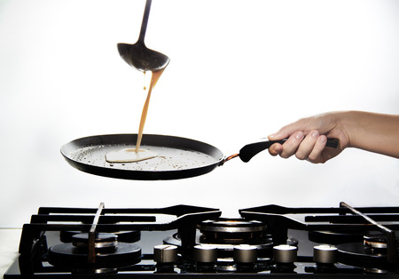Making Pancakes on frying pan の写真素材