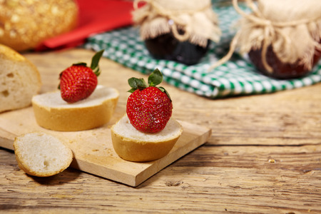Fresh strawberries on a slice of breadの写真素材