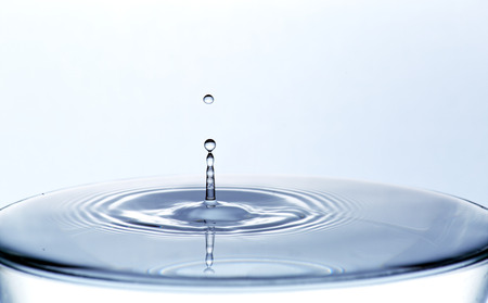 Clean water and water bubbles in blueの写真素材