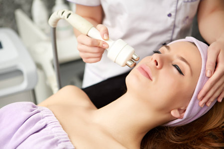 woman face treatment in medical spa centerの写真素材