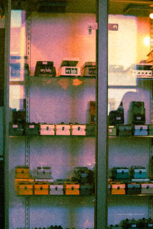 Shelves with goods in the store. Vintage style photo.の写真素材