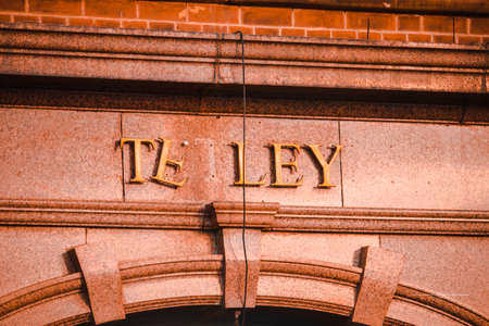 logo and text sign on buildingの写真素材