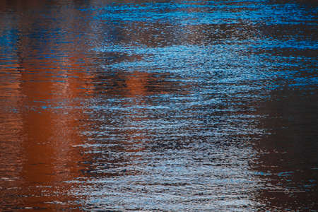 Reflection of the sun on the surface of the water. Abstract background.の写真素材