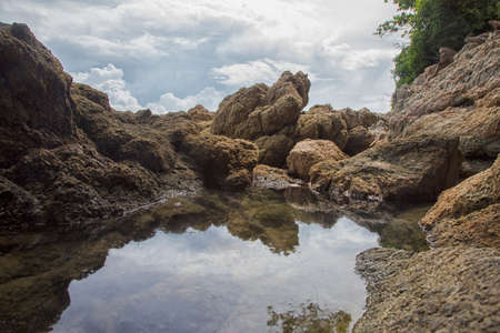 The rock surround water seaの写真素材