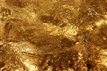 Clear water with amber backgroundの写真素材