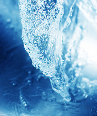 Clear rushing water in a wave