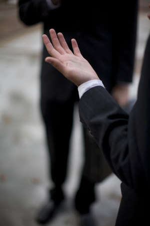 Two businessmen discussing, midsectionの写真素材