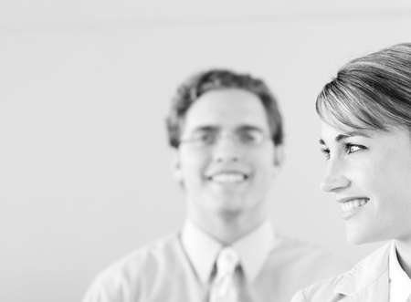head and shoulder shot of smiling businessman and businesswomanの写真素材