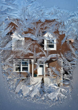 Winter street through the icy window...のeditorial素材