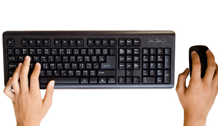 typing keyboard and click mouse in play game positionの写真素材