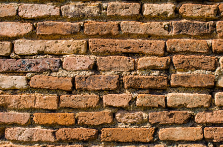 old brick wall of ancient temple at Sukhothai historical park