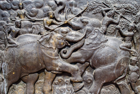 bas relief of battle of elephant of ancient Sukhothai kingdom