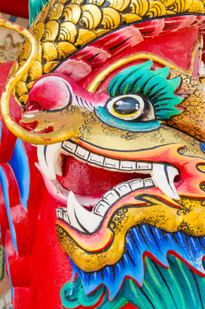 head of dragon statue decorate on poleの写真素材