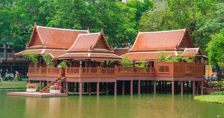Thai style house on lakeの写真素材