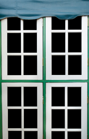 Background of four white windowの写真素材