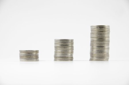 three thai coin stacks on white background