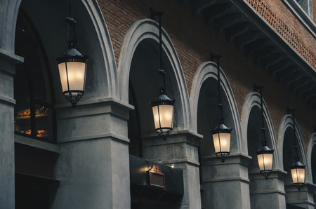 brick vintage building  with arch and lampの写真素材
