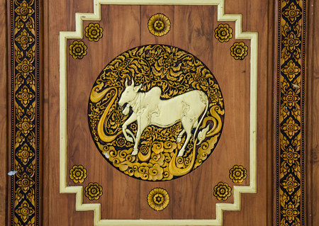 wooden taurus zodiac symbol carveの写真素材